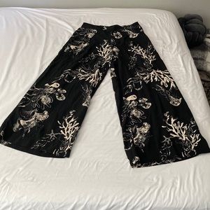 Coral patterned black pants